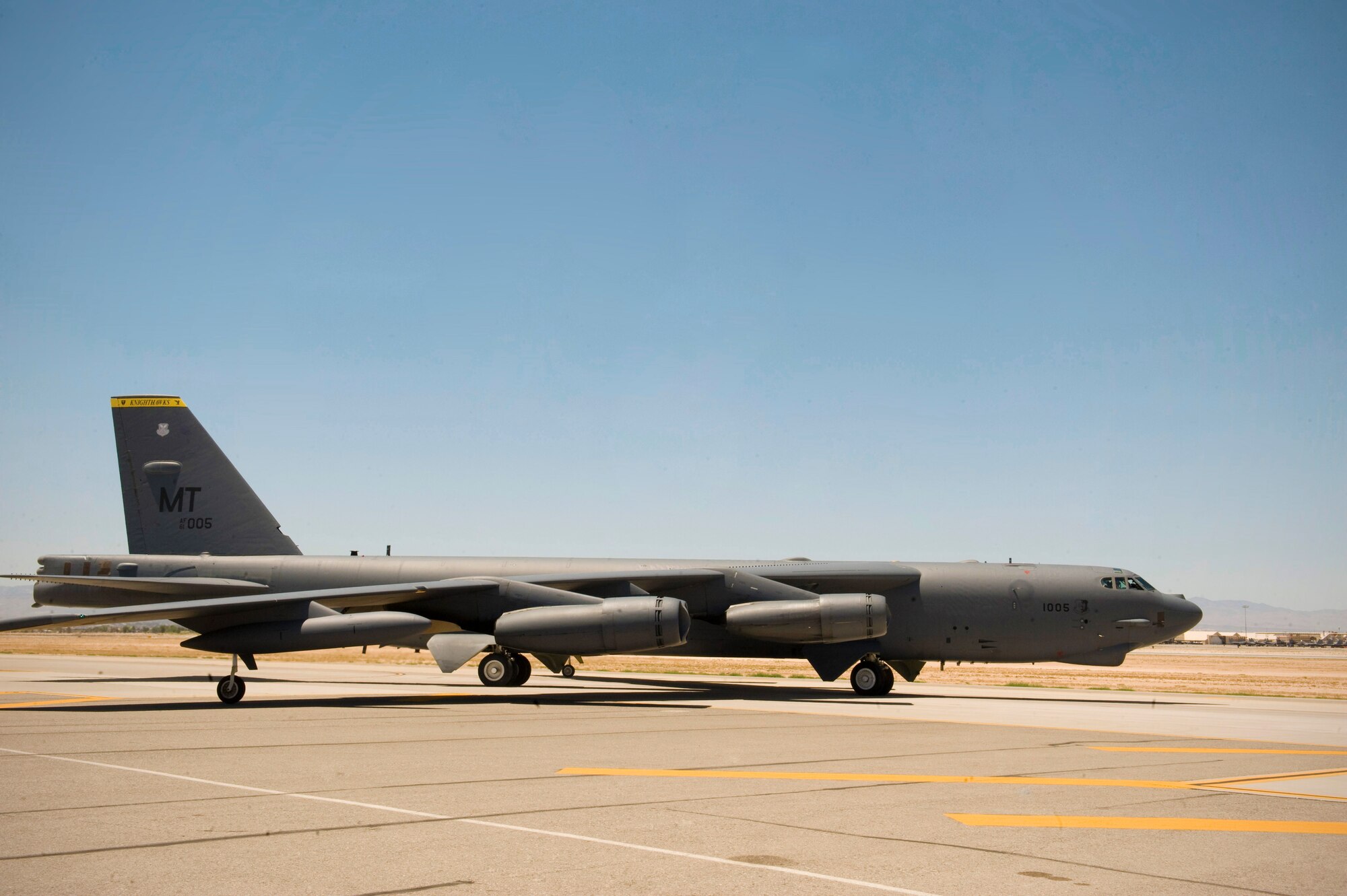 A B-52H Stratofortress assigned to the 69th Bomb Squadron, Minot Air Force Base, N.D., taxis for take off during Red Flag 15-3 at Nellis Air Force Base, Nev., July 15, 2015. The B-52 is a long-range heavy bomber capable of dropping or launching a wide variety of munitions on any target anywhere in the world. (U.S. Air Force photo by Airman 1st Class Rachel Loftis)