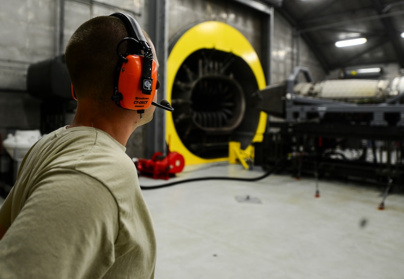 U.S. Air Force Senior Airman Michael Smith, 1st Maintenance Group aerospace propulsion technician, observes an engine run at Langley Air Force Base, Va., July 22, 2015. During the run, technicians check the engine for any leaks or discrepancies that require repair. (U.S. Air Force photo by Senior Airman Kayla Newman/Released)