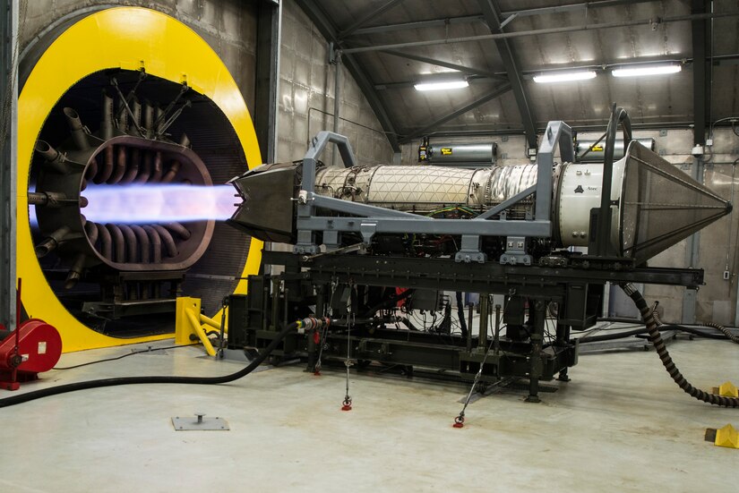 A Pratt and Whitney F119 engine performs an engine run at the 1st Maintenance Group propulsion flight Hush House at Langley Air Force Base, Va., July 22, 2015. The engine is connected to all electrical and mechanical propulsion systems as if it were installed in an aircraft, and is tested at maximum capability. (U.S. Air Force photo by Senior Airman Kayla Newman/Released)