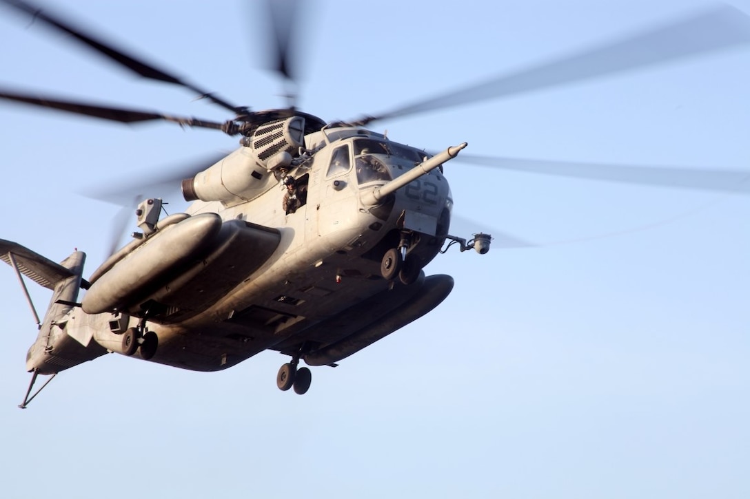 INDIAN OCEAN (July 23, 2015) - A U.S. Marine CH-53E Super Stallion from the “Greyhawks” of Marine Medium Tiltrotor Squadron 161 (Reinforced), 15th Marine Expeditionary Unit, departs the amphibious assault ship USS Essex (LHD 2). The 15th MEU maintains the readiness of the aircraft and pilots through continuous flight operations and maintenance while deployed. The “Greyhawks” are the aviation combat element of the 15th MEU, based out of Camp Pendleton, California, and embarked aboard the Essex, are conducting naval operations in the 6th Fleet area of operations in support of U.S. national security interests in Europe and Africa. (U.S. Marine Corps photo by Staff Sgt. Miguel Carrasco/Released)