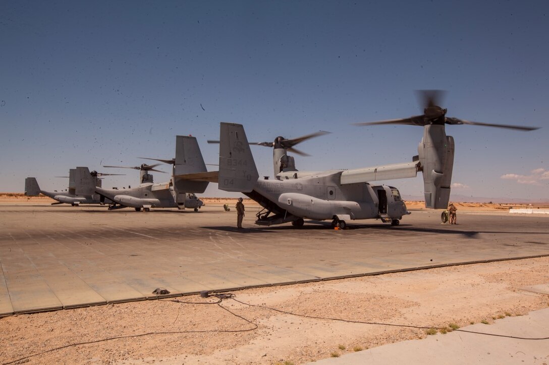 Ospreys with Marine Medium Tiltrotor Squadron 268, Marine Aircraft Group 16, 3rd Marine Aircraft Wing, prepare to depart an expeditionary airfield at Camp Wilson aboard Marine Corps Air Ground Combat Center Twentynine Palms, Calif., July 17, to conduct a tactical recovery of aircraft and personnel mission with 3rd Platoon, C Company, 1st Battalion, 7th Marines, during a certification exercise for Special Purpose Marine Air-Ground Task Force Crisis Response Central Command 16.1. SPMAGTF-CR-CC is a fully capable crisis response unit with the ability to project power over the vast distances using organic air and ground combat assets.