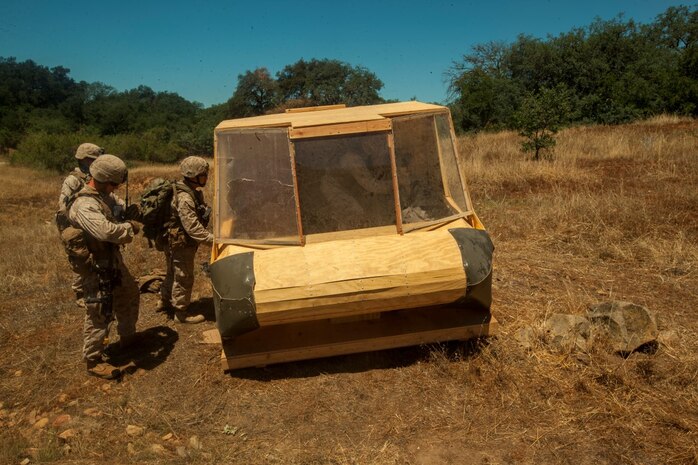 Infantry Marines with 3rd Platoon, Company C, 1st Battalion, 7th Marines, locate and assess a simulated downed aircraft near landing zone K Springs aboard Marine Corps Base Camp Pendleton, Calif., July 17, while conducting a tactical recovery of aircraft and personnel mission during a certification exercise for Special Purpose Marine Air-Ground Task Force Crisis Response Central Command 16.1. The SPMAGTF is an expeditionary unit designed to provide simultaneous, self-contained crisis response mission sets in a variety of diverse and austere operating environments.