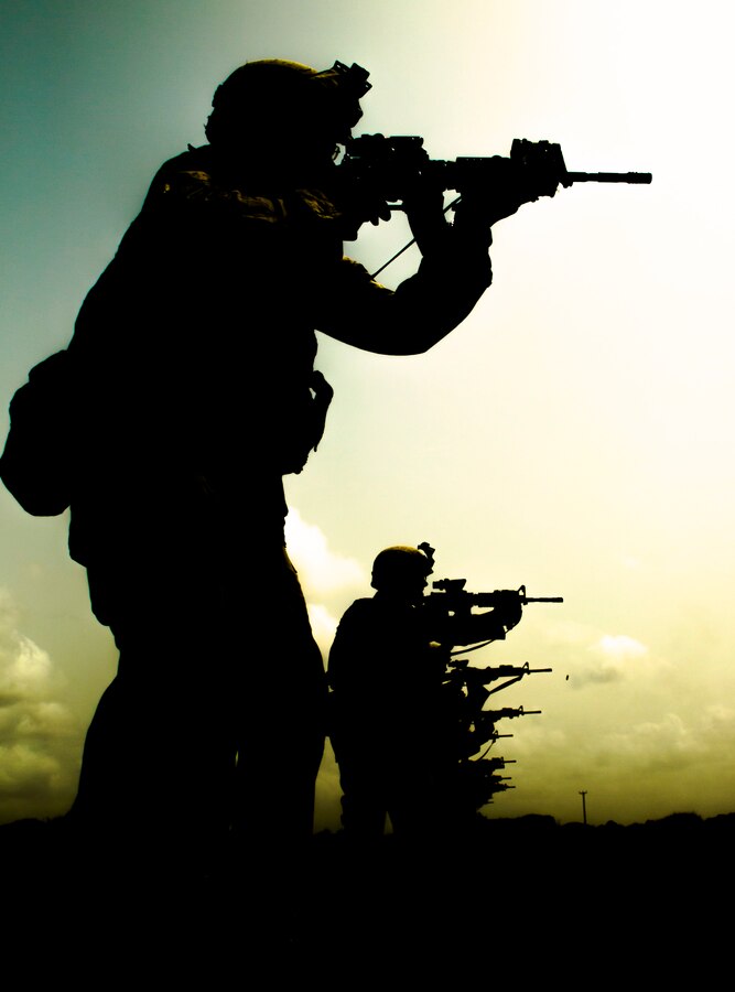 U.S. Marines with Special-Purpose Marine Air-Ground Task Force Crisis Response-Africa fire their weapons on a range near their Cooperative Security Location in Accra, Ghana, April 4, 2015. The live-fire exercise allowed the Marines to maintain their weapons proficiency as a crisis-response force for western Africa. (U.S. Marine Corps photo by Sgt. Paul Peterson/Released)
