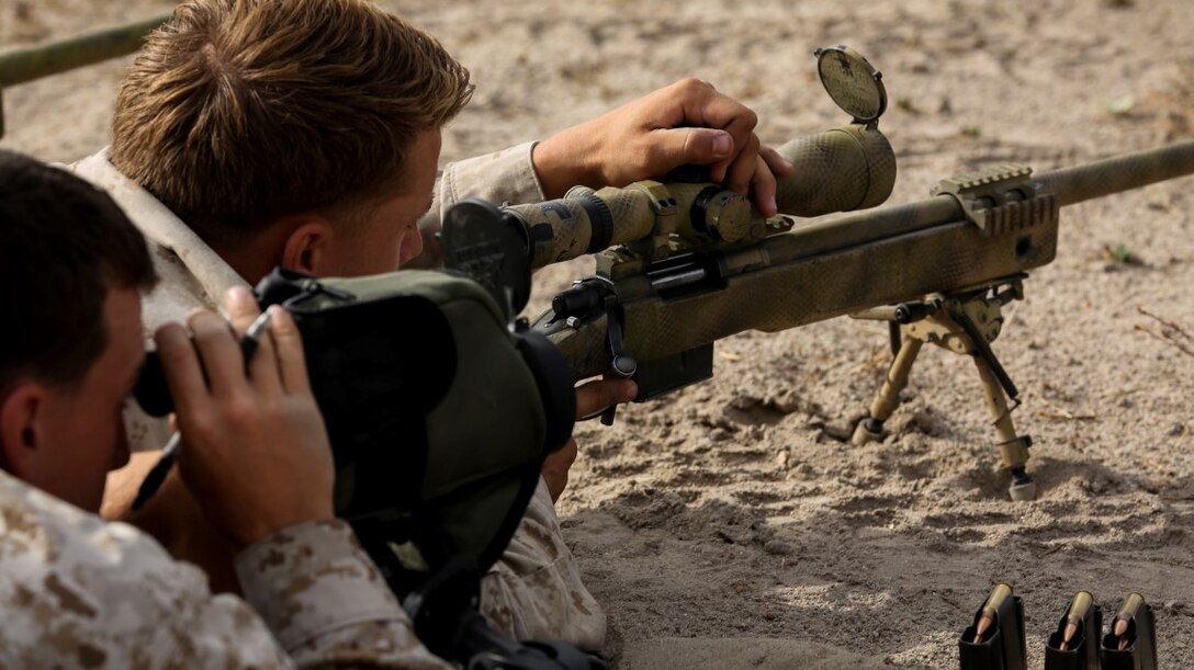 Marines with 1st Reconnaissance Battalion, 1st Marine Division, 1st Marine Expeditionary Force, conduct unknown distance shooting during the Pre-Scout Sniper Course at Marine Corps Base Camp Pendleton, California, July 17, 2015. The six-week long course is designed to prepare and screen students for the follow-on training at Scout Sniper Basic School.