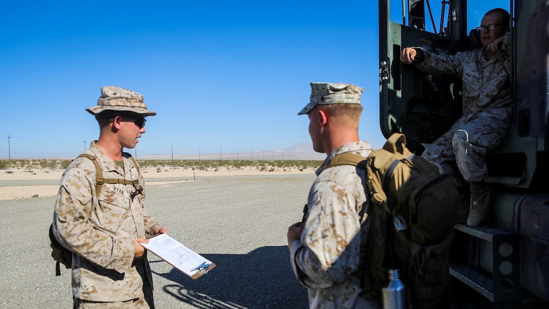 Marines with Combat Logistics Battalion 1, Ammunition Detachment, and 1st Battalion, 7th Marine Regiment, inspect a 7-ton Medium Tactical Vehicle prior to loading it with ammunition during an Integrated Training Exercise at Marine Corps Air Ground Combat Center Twentynine Palms, California, July 22, 2015. Ammunition distribution is performed at the field ammunition supply point, which is set-up and operated by CLB-1, Ammunition Detachment. CLB-1 is currently training to support Special Purpose Marine Air Ground Task Force Crisis Response Central Command 16.1. 