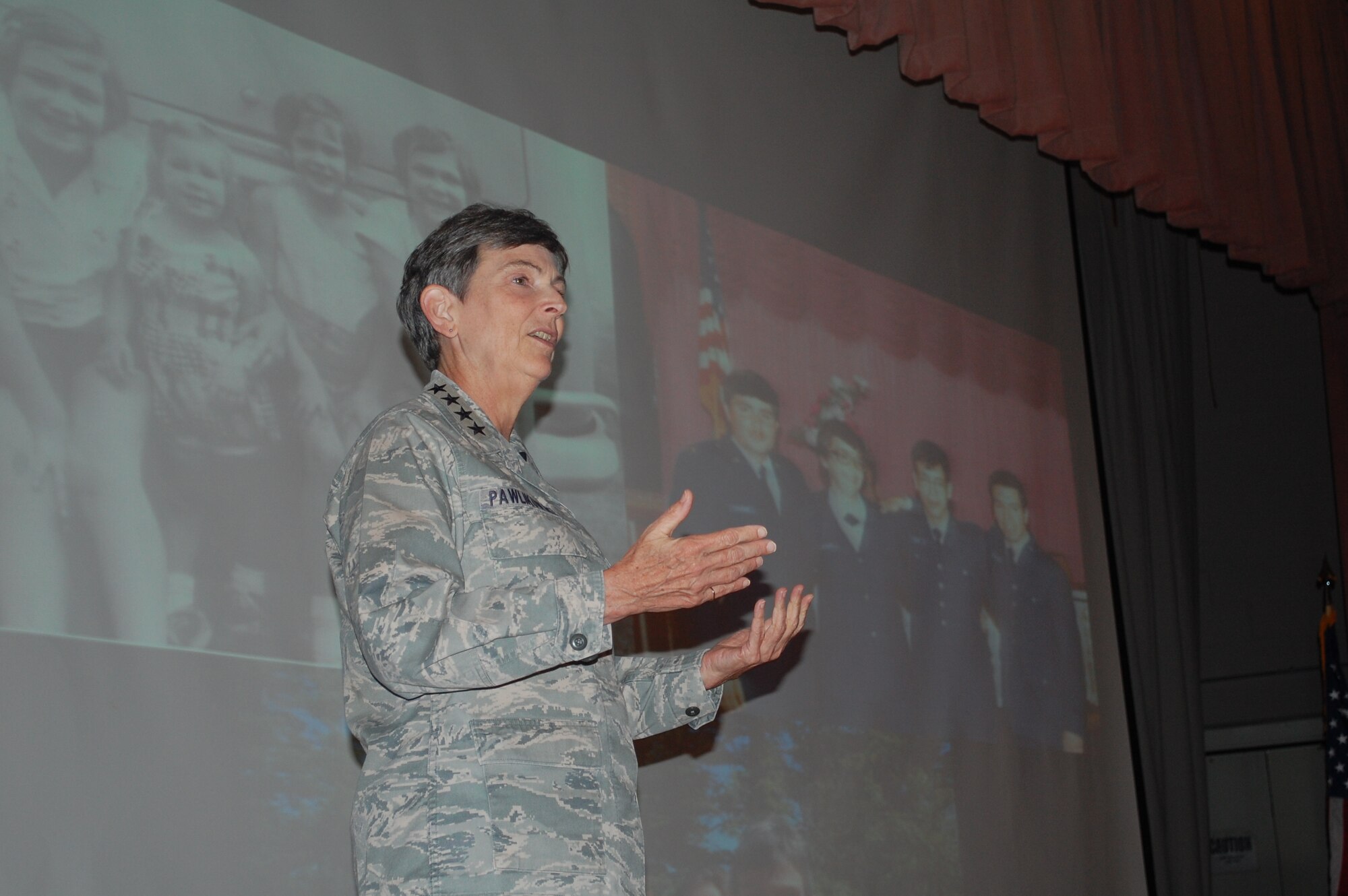 Gen. Ellen Pawlikowski promotes the new Air Force Materiel Command mission and vision at a Commander's Call July 23, 2015 to a room of Airmen, Sailors and Soldiers at Joint Base San Antonio-Lackland. She discussed the changes in AFMC and the importance of agility for present and future AFMC operations. (U.S. Air Force photo/Master Sgt. Christian Michael/RELEASED)