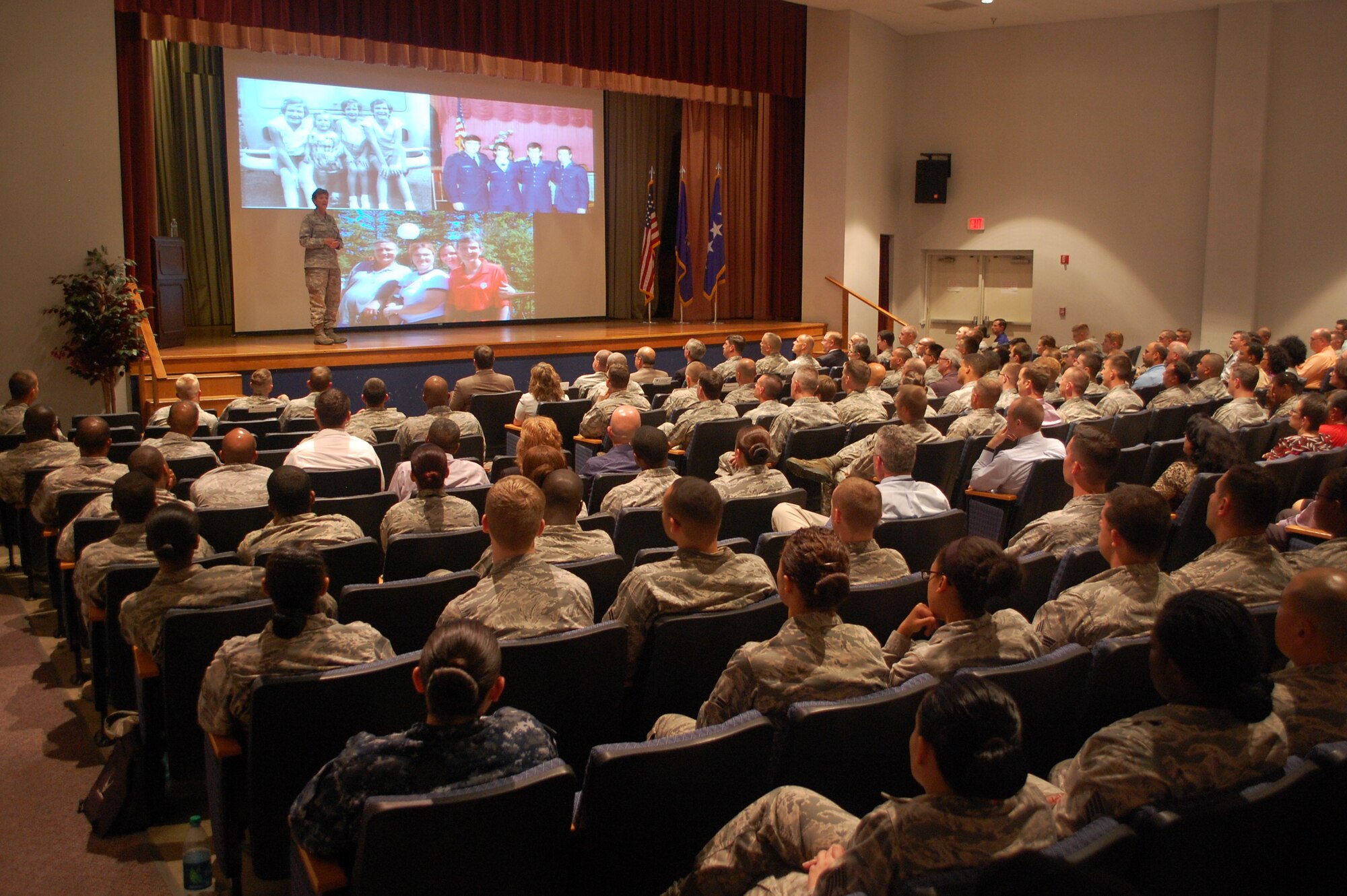 Gen. Ellen Pawlikowski promotes the new Air Force Materiel Command mission and vision at a Commander's Call July 23, 2015 to a room of Airmen, Sailors and Soldiers at Joint Base San Antonio-Lackland. She discussed the changes in AFMC and the importance of agility for present and future AFMC operations. (U.S. Air Force photo/Master Sgt. Christian Michael/RELEASED)
