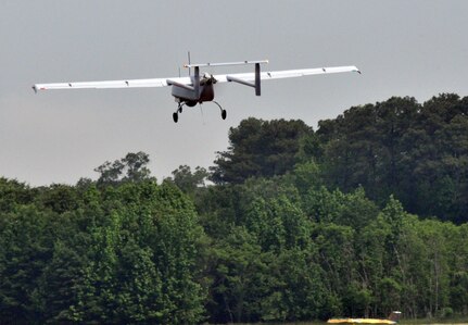 The Aerostar Unmanned Aerial System takes off during testing at Naval Support Facility Dahlgren during testing May 22. The test was the first fixed-wing flight from Dahlgren's runway in more than a decade and represented several months of preparation between the base, the Naval Surface Warfare Center Dahlgren Division, the Unmanned Aerial Systems Test Directorate, Naval Air Warfare Center Aircraft Division and the FAA. (