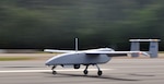 The Aerostar Unmanned Aerial System takes off during testing at Naval Support Facility Dahlgren during testing May 22. The test was the first fixed-wing flight from Dahlgren's runway in more than a decade and represented several months of preparation between the base, the Naval Surface Warfare Center Dahlgren Division, the Unmanned Aerial Systems Test Directorate, Naval Air Warfare Center Aircraft Division and the FAA. (