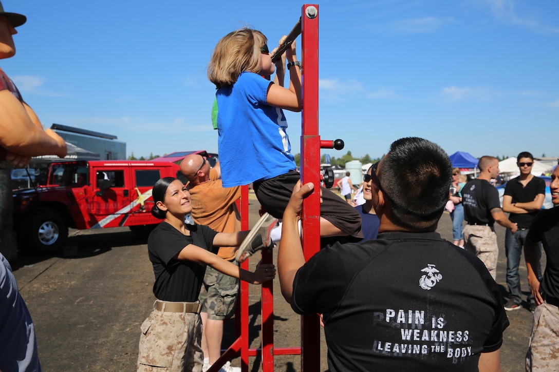 U.S. Marines from 12th Marine Corps District, Marine Corps Recruit Depot San Diego and Marines from Recruiting Sub Station Beaverton, Recruiting Station Portland, set-up in full force at the Oregon International Airshow, July 18. (U.S. Marine Corps photo by Sgt. Tyler C. Vernaza/released)