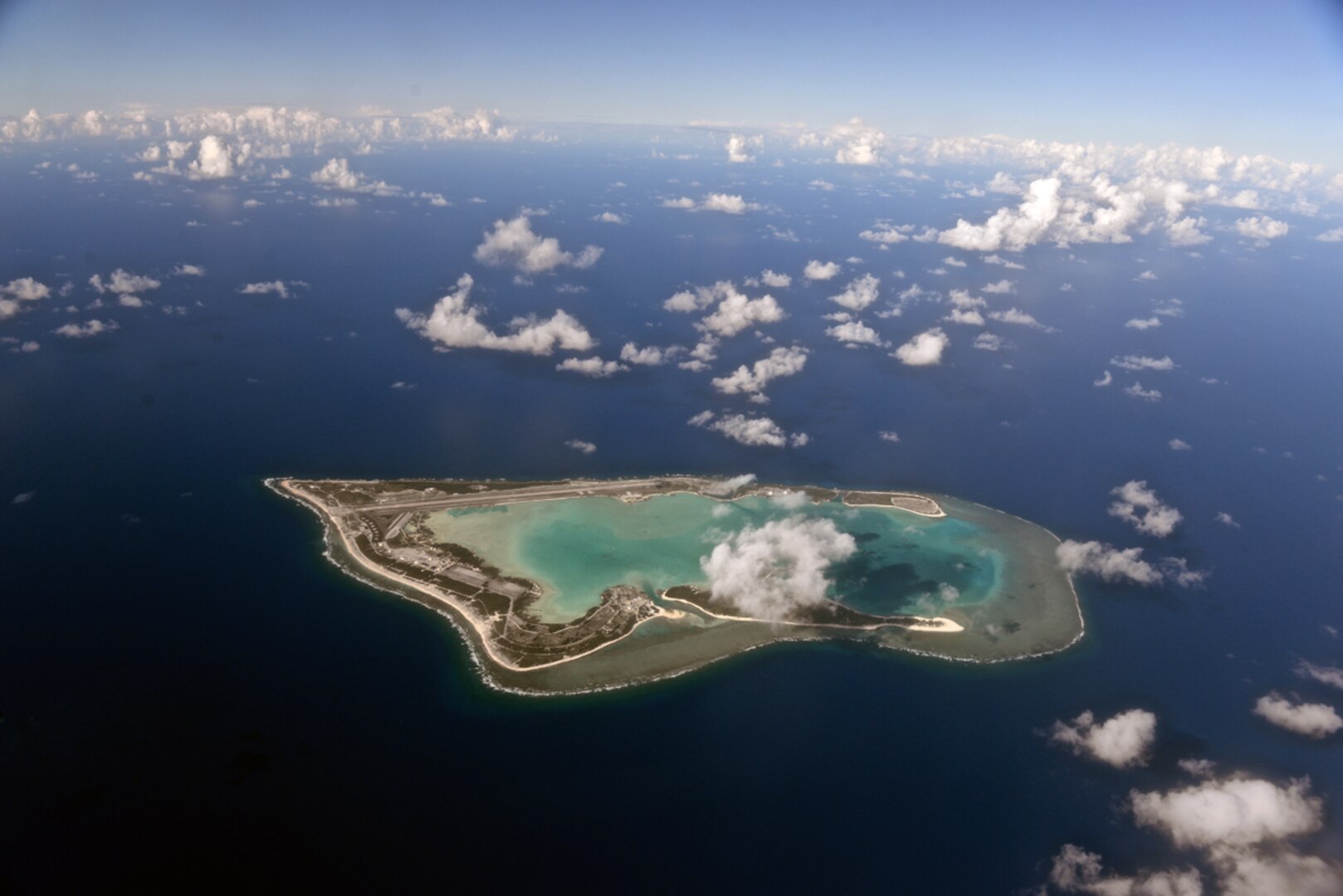 WAKE ISLAND AIRFIELD (July 20, 2015) - Wake Island, pictured as viewed from the north, was completely evacuated in preparation for Typhoon Halola closing in on the small atoll. A team with the 36th Contingency Response Group deployed from Andersen Air Force Base, Guam, to the atoll to assist permanently assigned airfield staff in storm recovery efforts. (U.S. Air Force photo by Senior Airman Alexander W. Riedel/Released)