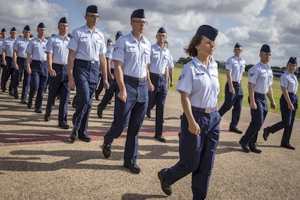For the first time in Air Force Basic Military Training, Airmen march in integrated Heritage Flights during the Air Force Basic Training Graduation Parade July 17 at Joint Base San Antonio-Lackland. The Heritage flights, named after enlisted members in Air Force history, are part of a new initiative to completely gender integrate all facets of Air Force Basic Training and instill honor, as well as a deep understanding of the core values and appreciation for Airmen who paved the way for today’s Air Force