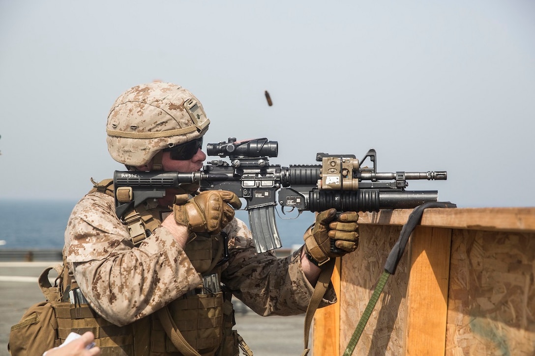 U.S. Marines combat marksmanship at sea