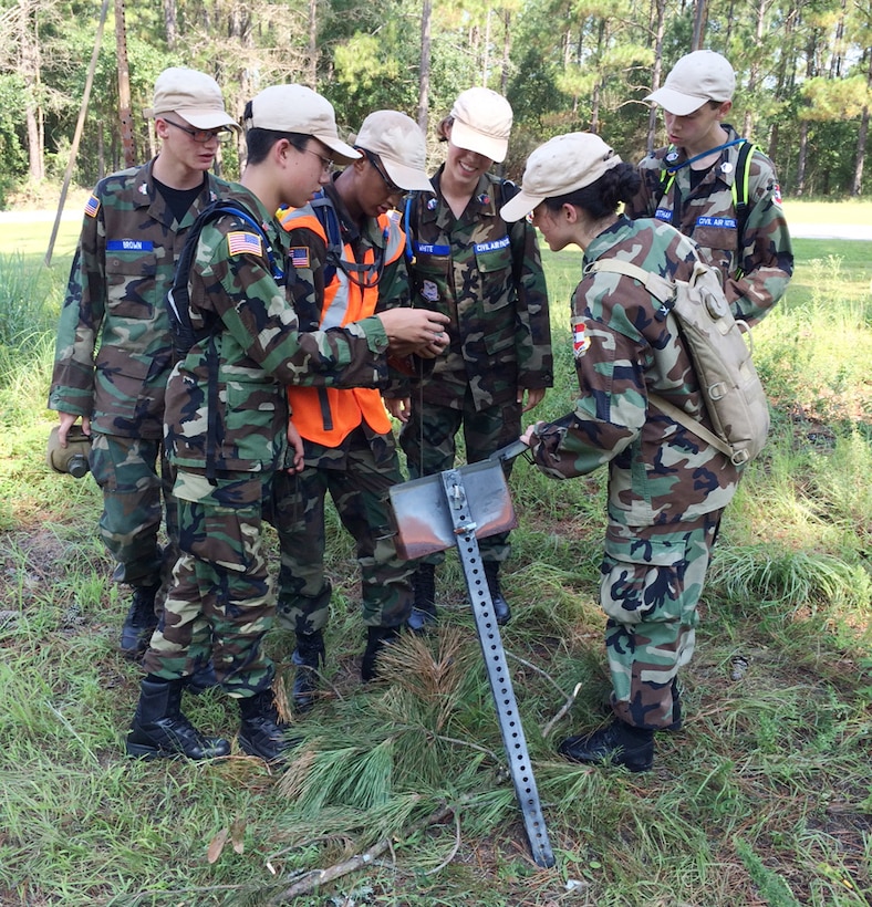 Georgia Wing Civil Air Patrol cadets collaborate before setting out for their next objective during land navigation training, July 22. This is the fourth year the Georgia Wing CAP has conducted its weeklong summer encampment at Marine Corps Logistics Base Albany. 