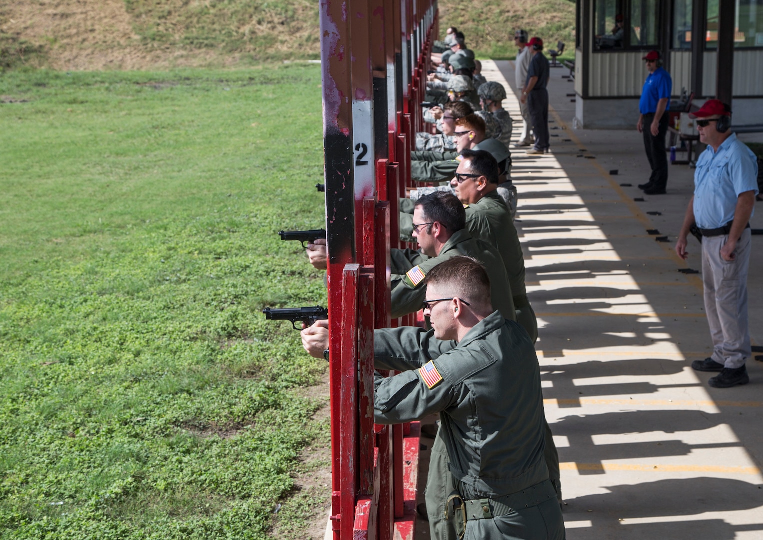 Weapons qualification course students fire their Beretta M9 pistols during the range portion of their training July 6 at the Joint Base San Antonio-Lackland Medina Annex. During this portion, students practice both kneeling and standing firing positions and record the accuracy of their hits with combat arms instructors to verify their weapon competency. The weapons qualification course is part of the Combat Arms Training and Maintenance program that introduces basic firearm safety and use practices for Airmen in Air Force Basic Military Training and refreshes that training for JBSA members deploying or undergoing a permanent change of station. 
