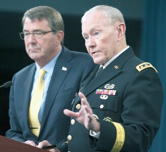 Secretary of Defense Ash Carter and 18th Chairman of the Joint Chiefs of Staff Gen. Martin E. Dempsey brief the press in the Press Briefing Room at the Pentagon, July 1, 2015.  (DoD photo by Mass Communication Specialist 1st Class Daniel Hinton/released)