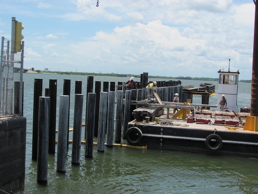 Traditional wood pilings at Canaveral Lock have been replaced by new environmentally friendly and long-lasting pilings.