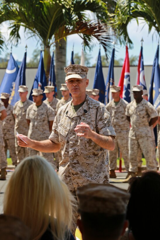 U.S. Marine Corps Forces, Pacific Sergeant Major William T. Stables speaks during the relief and appointment ceremony on Camp H. M. Smith, Hawaii, July 23, 2015. During the ceremony, Sgt. Maj. William T. Stables relinquished his duties as MARFORPAC sergeant major to Sgt. Maj. Paul G. McKenna. 