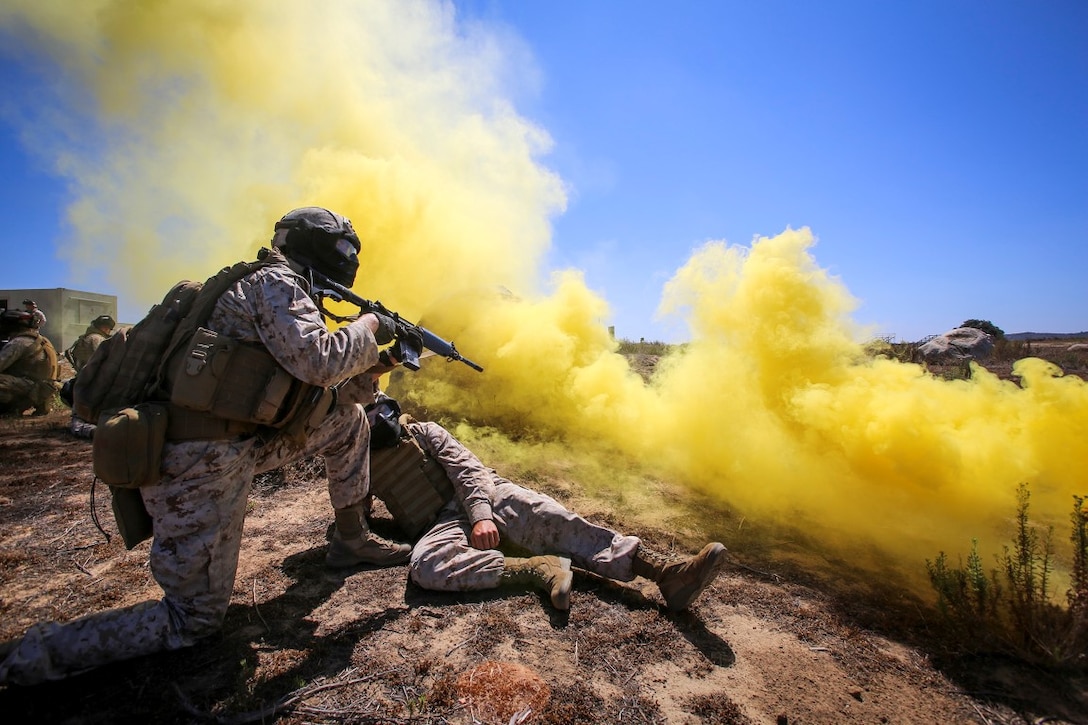 Marines with 2nd Brigade Platoon, 1st Air Naval Gunfire Liaison Company, I Marine Expeditionary Force, wait to be medically evacuated during a force-on-force training exercise aboard Marine Corps Base Camp Pendleton, Calif., July 14, 2015. The training event aimed to enhance ANGLICO’s capabilities in urban environments, while conducting a tactical recovery of aircraft and personnel mission by integrating close air support assets, joint terminal attack controllers and joint fire observers development. 