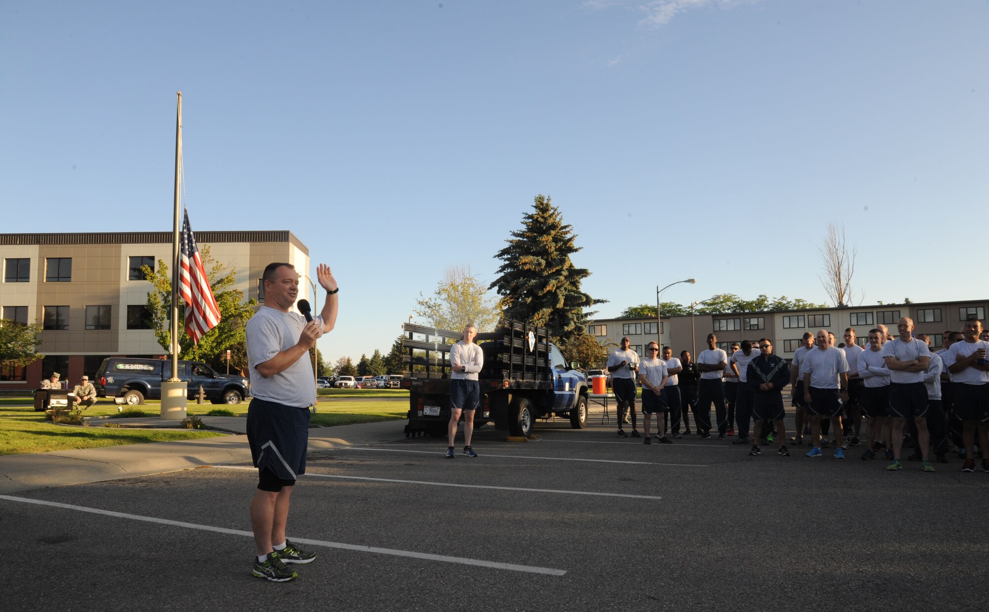 Col. Brian McDaniel, 92nd Air Refueling Wing commander, addresses Airmen prior to the commencement of the wing run July 24, 2015, at Fairchild Air Force Base, Wash. The monthly fun run was held on the “Hospital Loop.” Wing runs encourage team morale and welfare through a shared goal. (U.S. Air Force photo/Senior Airman Sam Fogleman)