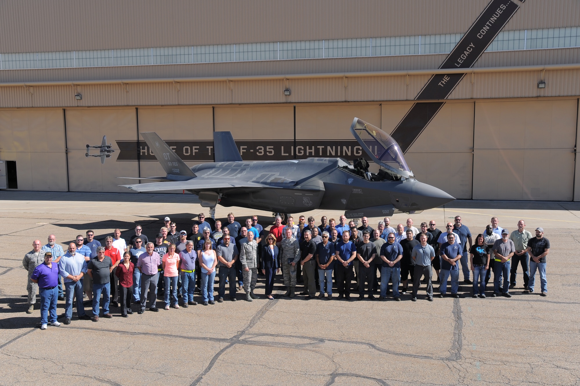 Secretary of the Air Force Deborah Lee James poses with Ogden Air Logistics Complex F-35 aircraft maintainers and military leaders Thursday, July 23, at Hill Air Force Base, Utah. Hill personnel have a key role in F-35 depot maintenance, modification, and repair and James got a firsthand look and insights into the process during her visit to the base. She praised the Air Force Sustainment Center's "AFSC Way" effort to provide cost-effective readiness to the warfighter. (U.S. Air Force photo by Todd Cromar)