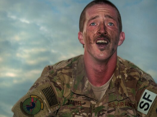 Airman 1st Class Jesse Daniel, 5th Security Forces Squadron member, catches his breath during tryouts for his squadron’s Global Strike Challenge Competition team at Minot Air Force Base, N.D., July 23, 2015. Daniel finished both phases of the tryouts in first place and received a final time of 50 minutes 23 seconds. (U.S. Air Force photo/Senior Airman Stephanie Morris)