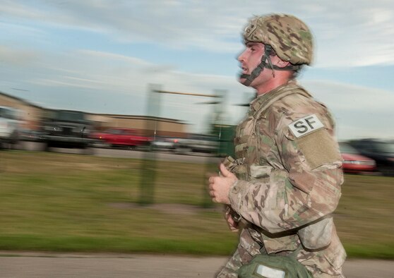 Senior Airman Brandon Lepkowski, 5th Security Forces Squadron member, completes his third lap during the first  phase of tryouts for his squadron’s Global Strike Challenge Competition team at Minot Air Force Base, N.D., July 23, 2015. Lepkowski was a member of the 5th SFS GSC team last year and hopes to take part in the competition for 2015 in Guernsey, Wyo. (U.S. Air Force photo/Senior Airman Stephanie Morris)