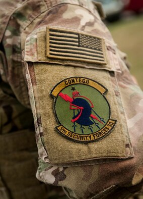 A 5th Security Forces Squadron patch adorns the shoulder of an Airman at Minot Air Force Base, N.D., July 23, 2015. The Airman competed for a spot on his squadron’s Global Strike Challenge Competition team which will go head-to-head for the title of best squadron with other bases across Air Force Global Strike Command. (U.S. Air Force photo/Senior Airman Stephanie Morris)