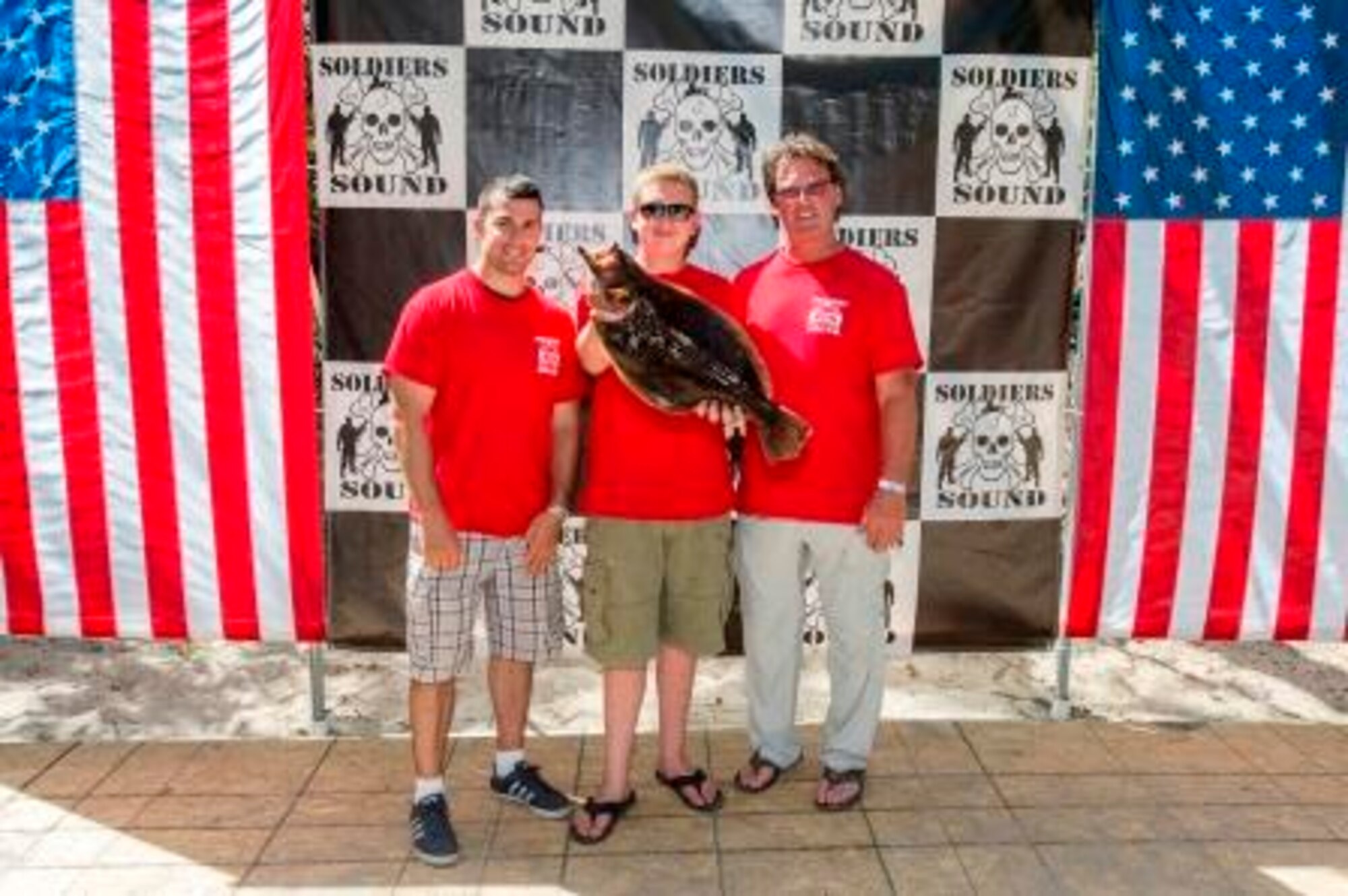Staff Sgt. Chris Arrigo (right), a member of the 106th Rescue Wing and boat captain Tony Voelker (left) helped 16-year old Jake DeLeo (middle) land the winning fish at the annual Soldiers on the Sound Fishing Tournament held at the Smithtown Bay Yacht Club June 13, 2015.

The Soldiers on the Sound Fishing Tournament is an annual fishing tournament with the goal of giving back and honoring the members of our armed forces who have served or are currently serving our country.