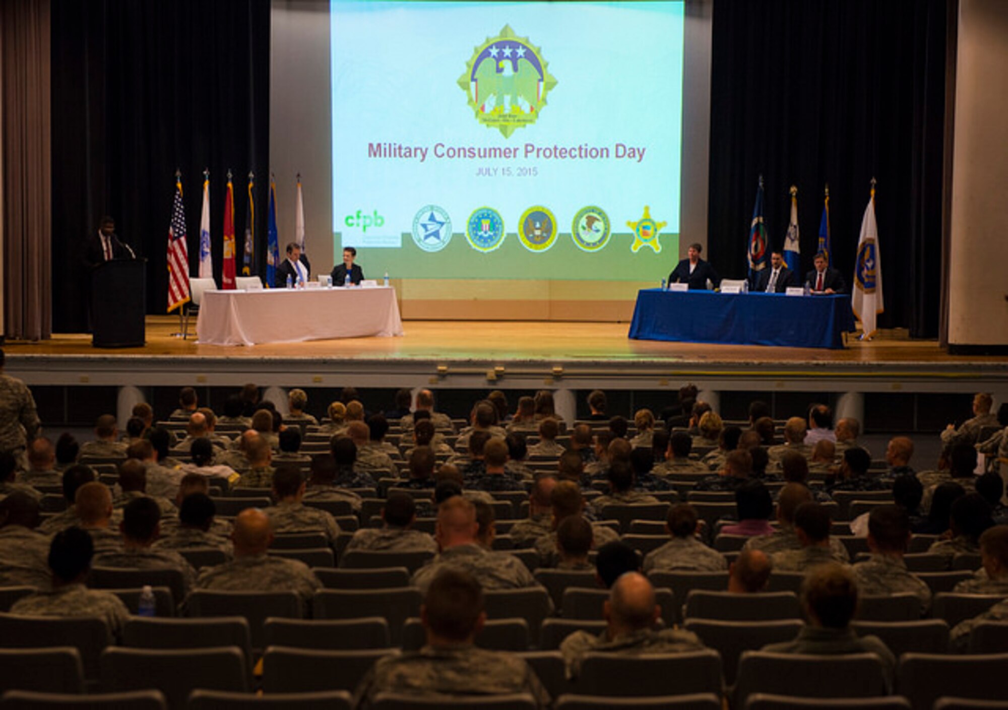 Members of the joint base community attend a consumer protection day on Joint Base McGuire-Dix-Lakehurst, N.J. July 15, 2015. The event focused on giving service members information about different scams they could possibly find themselves in.