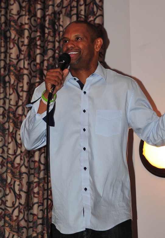 Fred McKinnon, comedian and U.S. Army Training and Doctrine Command information technology specialist, performs at the Fort Eustis Club on Fort Eustis, Va., June 27, 2015. McKinnon is a veteran and Hampton, Va., native, who started performing at local comedy clubs two years ago. He also performs at various military establishments including Veterans Affairs centers and military installations. (U.S. Air Force courtesy photo/released)