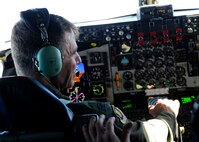 Col. James Dermer, 22nd Air Refueling Wing vice commander, shares a laugh with his co-pilot, July 23, 2015. Dermer flew his final military sortie before retirement, piloting a KC-135 Stratotanker as it escorted members of the U.S. Air Force Thunderbirds to their next performance location in Milwaukee, Wis. (U.S. Air Force photo by Senior Airman Victor J. Caputo)