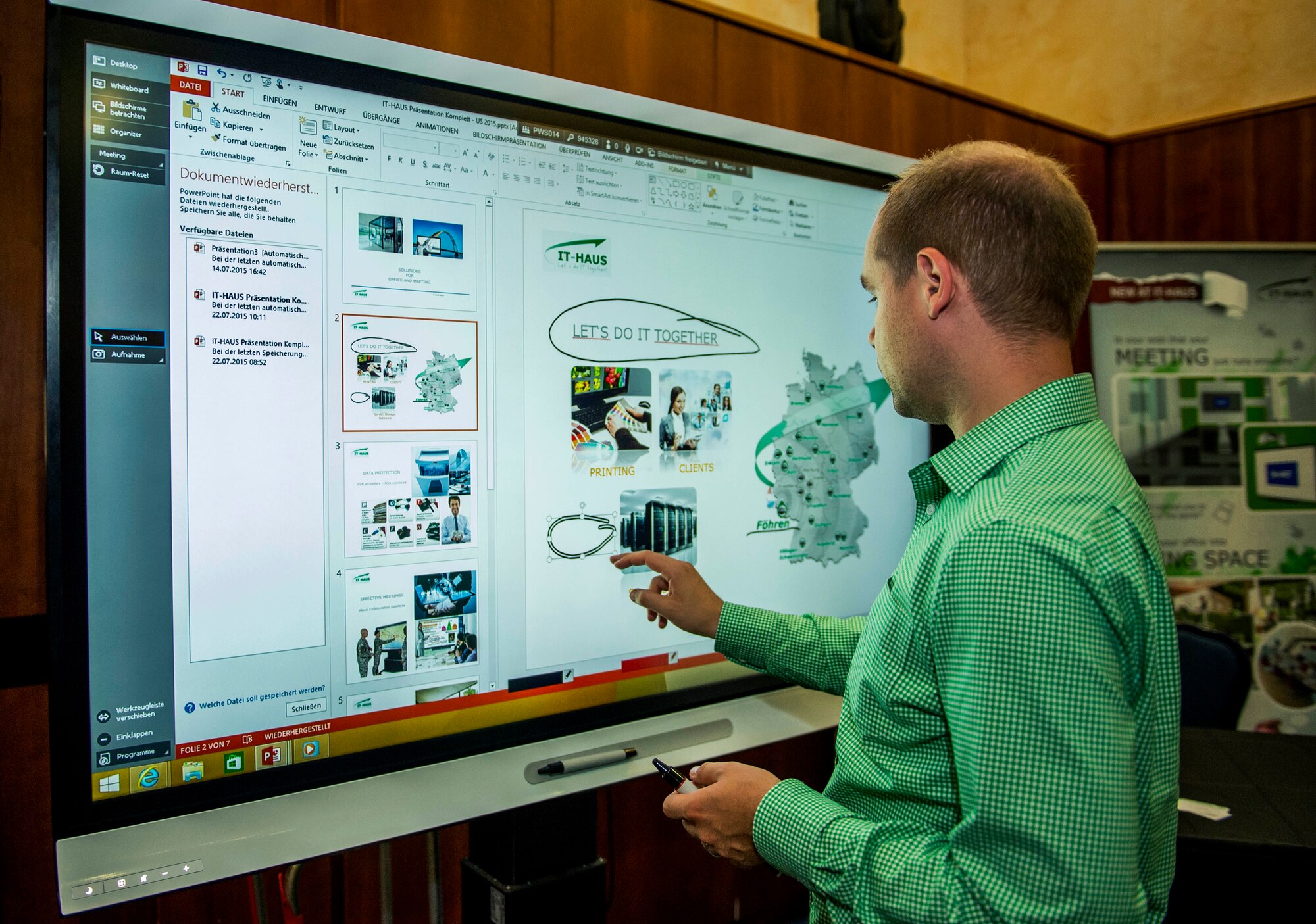 A technology industry representative showcases his company’s product during the Tech Expo at Club Eifel on Spangdahlem Air Base, Germany, July 22, 2015. Spangdahlem’s local Armed Forces Communication and Electronics Association, Eifel chapter, worked together with the 52nd Communications Squadron to host the exposition for the base community. (U.S. Air Force photo by Airman 1st Class Timothy Kim/Released)