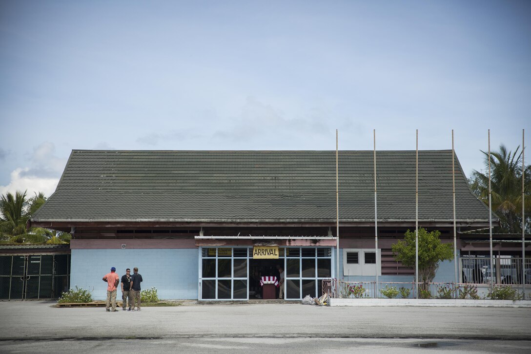 The arrival center in Tarawa, Kiribati temporarily houses the remains of approximately 36 Marines, July 25, 2015, who fought and died during the Battle of Tarawa in World War II. The remains were loaded onto a C-130J Hercules aircraft during a repatriation ceremony and will be return home to the United States for a proper burial.