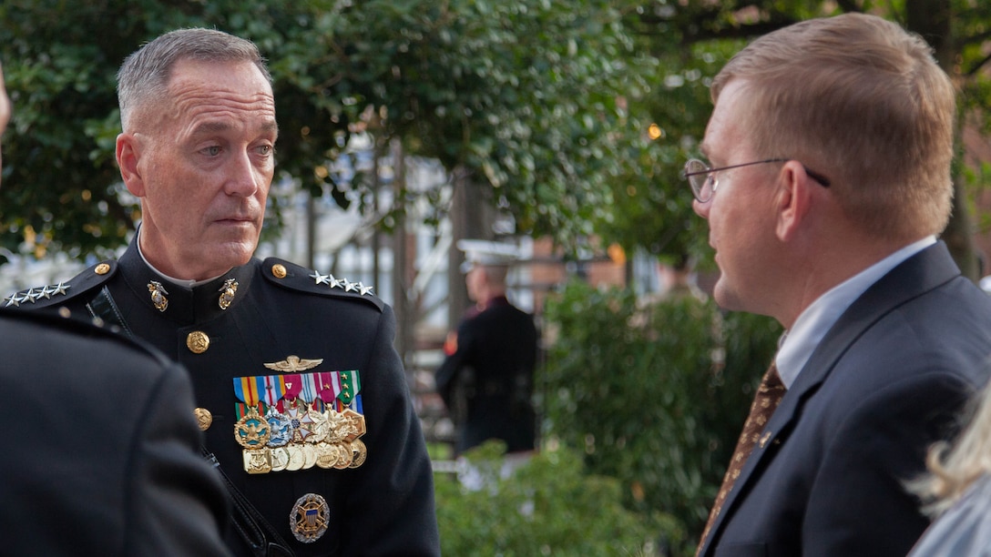 Honorary Marine Mark Noah meets Gen. Joseph Dunford, Jr., the 36th commandant of the Marine Corps, before the evening parade held at Marine Barracks Washington, D.C., July 24. History Flight, Noah’s organization, was loading the remains of 35 Marines to be brought home from Tarawa as the two spoke.
