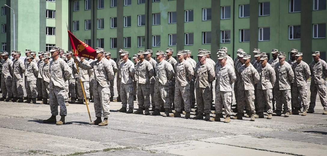 U.S. Marines with 10th Marine Regiment and the Black Sea Rotational Force stand alongside Romanian, Latvian, Lithuanian, Georgian and Bulgarian soldiers during the Exercise Agile Spirit closing ceremony July 22, 2015, at Vaziani Training Area, Georgia. Exercise Agile Spirit 15 involved a NATO Response Force level combined operation that incorporated a wide range of planning and execution challenges during a command post exercise and a field training exercise.