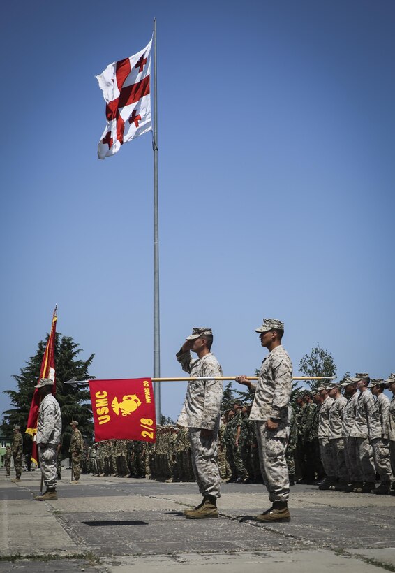 Capt. Frank Walker, company commander of Weapons Company, Black Sea Rotational Force, salutes during the Exercise Agile Spirit closing ceremony July 22, 2015, at Vaziani Training Area, Georgia. U.S. Marines along with Georgian soldiers and NATO Allies from Bulgaria and Romania participated in the exercise.  Exercise Agile Spirit 15 involved a NATO Response Force level combined operation that incorporated a wide range of planning and execution challenges during a command post exercise and a field training exercise.