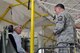 Air Force Reserve Senior Master Sgt. Phil Aliberti, 910th Aerial Spray Maintenance Flight Chief, (right) talks with Ohio U.S. Senator Rob Portman, seated at the control console of one of the 910th Airlift Wing’s Modular Aerial Spray Systems (MASS), during the senator’s visit here, July 17, 2015. Portman’s office requested the visit to meet with YARS leadership and get an up close view of installation assets and the unit’s equipment including the wing’s unique mission as operators and maintainers of the Department of Defense’s only large-area, fixed wing aerial spray capability. (U.S. Air Force photo/Master Sgt. Bob Barko Jr.)