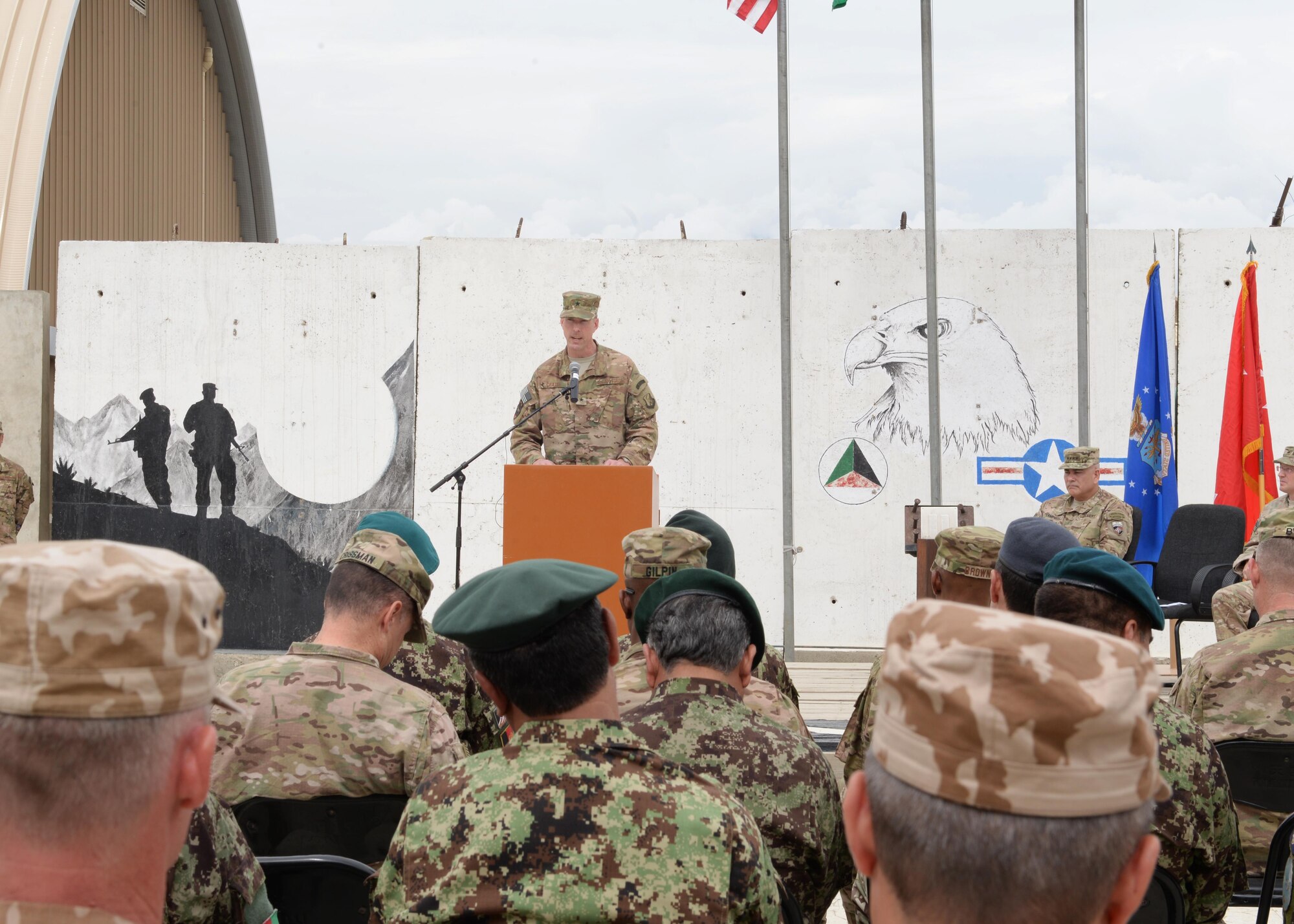 Brig. Gen. Christopher E. Craige speaks after taking command of the Train, Advise, Assist Command – Air (TAAC-Air), 438th Air Expeditionary Wing during a ceremony July 27, 2015, at Hamid Karzai International Airport, Kabul, Afghanistan. Presiding at the ceremony was Gen. John F. Campbell, commander, Resolute Support and U.S. Forces-Afghanistan. (U.S. Air Force photo by Senior Airman Cierra Presentado/Released)