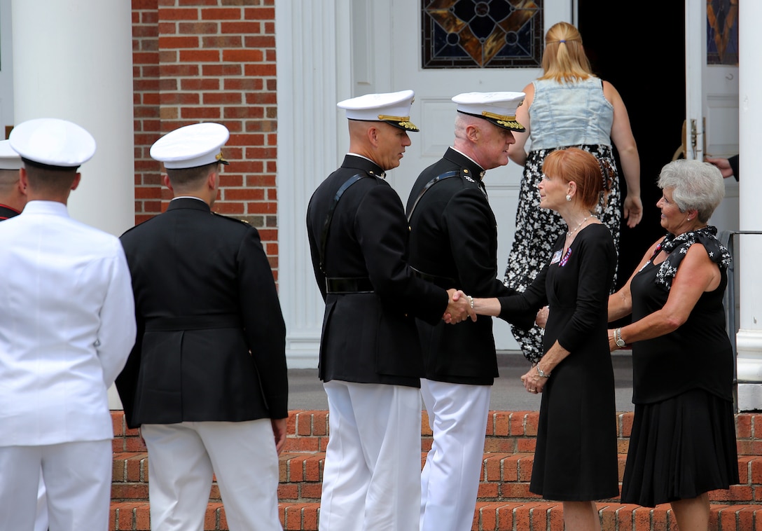Lt. General Richard P. Mills, commander of Marine Forces Reserve, and Maj. Gen. Paul W. Brier, commanding general of 4th Marine Division, attend Staff Sgt. David A. Wyatt’s funeral service at the United Methodist Church in Hixson, Tennessee, July 24, 2015. After the church service Wyatt was taken to Chattanooga National Cemetery to be buried with full military honors. 