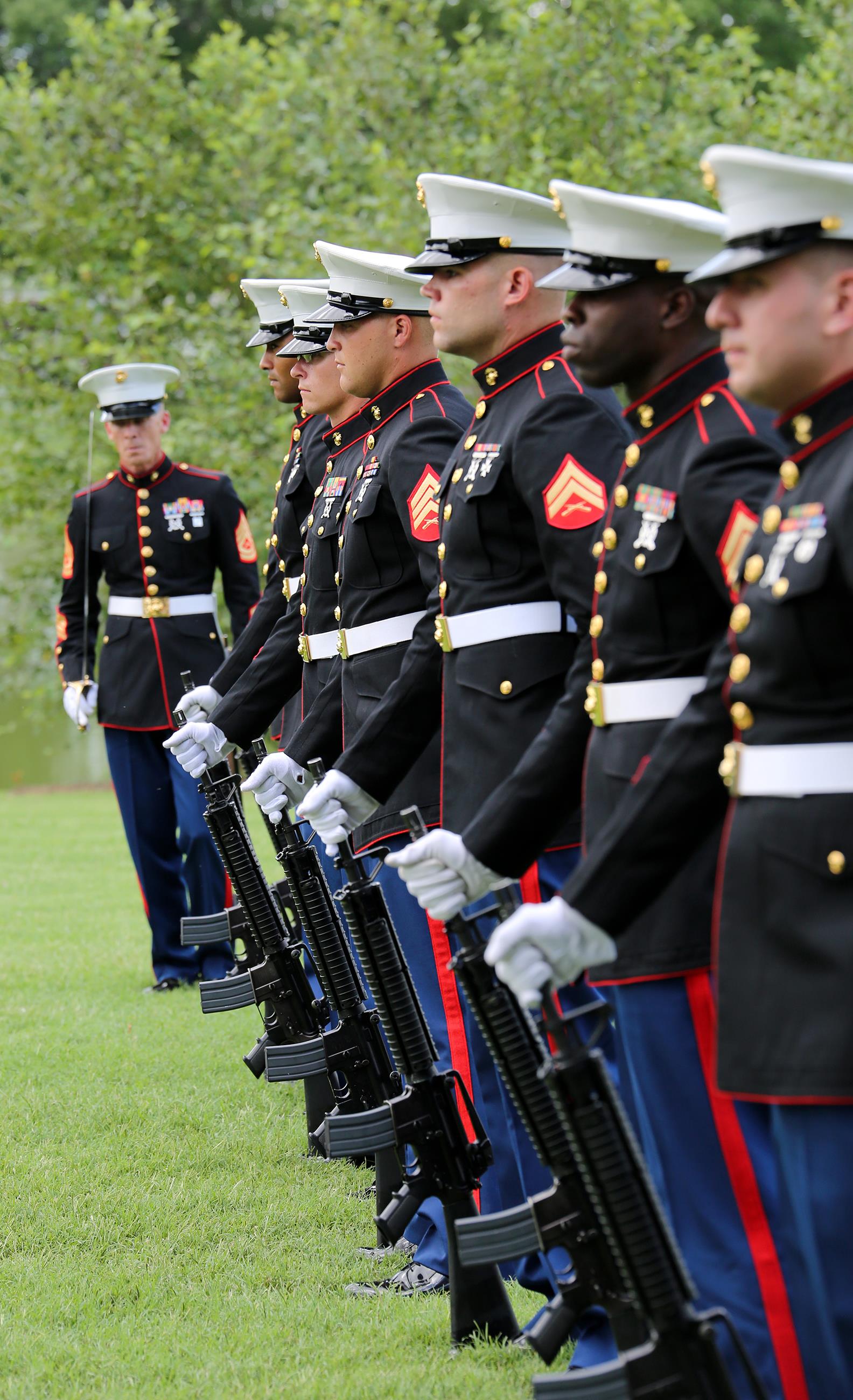 The Marines of Battery K, 2nd Battalion, 14th Marine Regiment prepare to fire three volleys in honor of Staff Sgt. David A. Wyatt at Chattanooga National Cemetery in Chattanooga, Tennessee, July 24, 2015. Family, Marines and hundreds of community members attended the funeral service to pay their respects to Wyatt and the sacrifice he gave for this country.