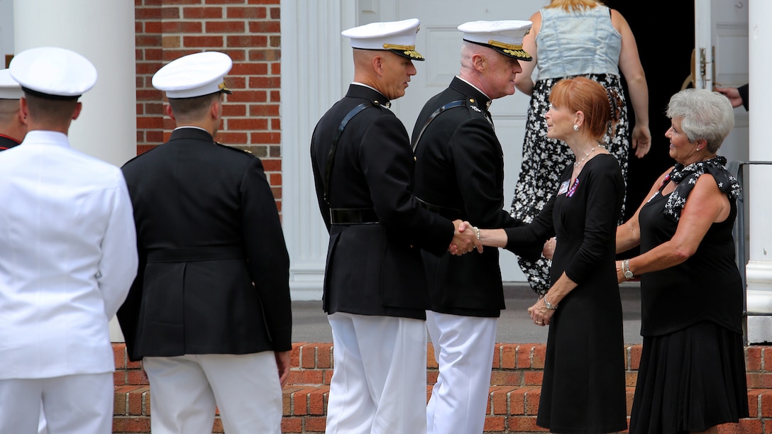 Lt. General Richard P. Mills, commander of Marine Forces Reserve, and Maj. Gen. Paul W. Brier, commanding general of 4th Marine Division, attend Staff Sgt. David A. Wyatt’s funeral service at the United Methodist Church in Hixson, Tennessee, July 24, 2015. After the church service Wyatt was taken to Chattanooga National Cemetery to be buried with full military honors.