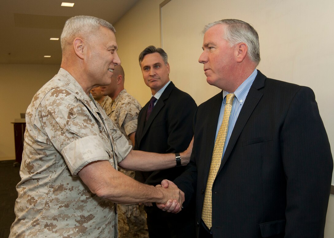 The Assistant Commandant of the U.S. Marine Corps, Gen. John M. Paxton, Jr., speaks with Marines from U.S. Marine Corps Forces Cyberspace, July 23, 2015. (U.S. Marine Corps photo by Sgt. Tia Dufour/Released)