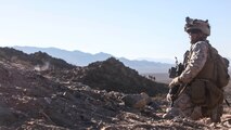 1st Lt. Cress Clippard, platoon commander for 1st Platoon, Company C, 1st Battalion, 7th Marines, observes his Marines’ approach during platoon attack drills, July 24, aboard Marine Corps Air Ground Combat Center Twentynine Palms, Calif. Training began for the Marines of Company C with a combined arms fire and maneuver exercise as part of their Integrated Training Exercise in preparation for their upcoming deployment with Special Purpose Marine Air Ground Task Force Crisis Response Central 16.1 Command scheduled to depart later this year.