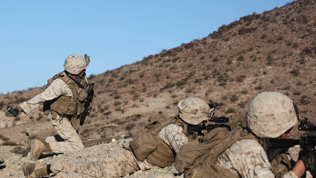 Lance Cpl. Steven Hoggand, a machine gunner and section leader with 1st Platoon, Company C, 1st Battalion, 7th Marines, directs his Marines’ fire while suppressing an enemy position during platoon attack drills, July 24, aboard Marine Corps Air Ground Combat Center Twentynine Palms, Calif. Training began for the Marines of Company C with a combined arms fire and maneuver exercise as part of their Integrated Training Exercise in preparation for their upcoming deployment with Special Purpose Marine Air Ground Task Force Crisis Response Central Command 16.1 scheduled to depart later this year.