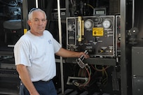 John Sistrunk, Defense Contract Services, Incorporated International Logistics Group refueler, monitors the fuel gages on his vehicle while refueling a T-38 aircraft July 27, 2015 at Joint Base San Antonio-Randolph. (U.S. Air Force photo by Joel Martinez/Released)