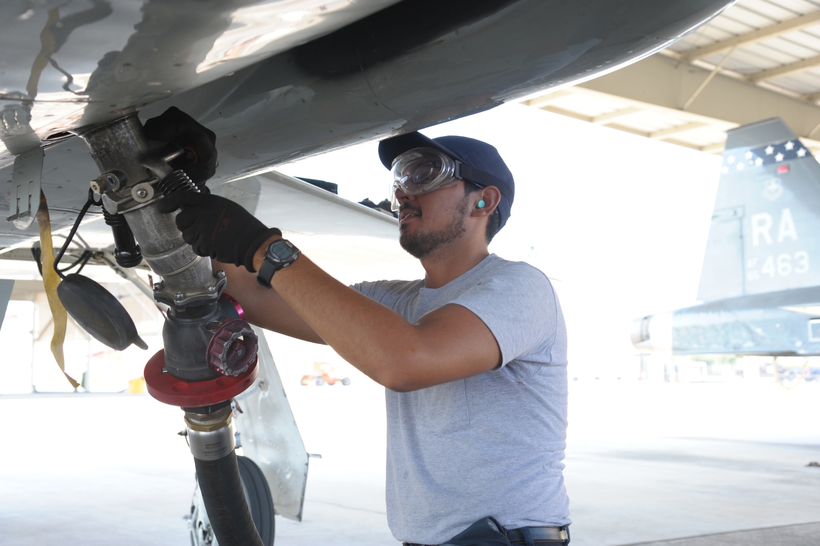 Mac Capistran, 12th Flying Training Wing maintenance mechanic prepares to fuel T-38 aircraft, July 27 at Joint Base San Antonio-Randolph.  The Maintenance Directorate performs launch/recovery and off/on equipment maintenance for T-1A, T-6A, T-38C and T-38 IFF aircraft valued at more than $760 million. (U.S. Air Force photo by Joel Martinez)