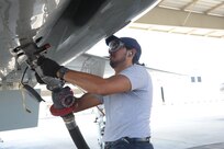 Mac Capistran, 12th Flying Training Wing maintenance mechanic, prepares to fuel a T-38 aircraft July 27, 2015 at Joint Base San Antonio-Randolph.  The Maintenance Directorate preforms launch/recovery and off/on equipment maintenance for T-1A, T-6A, T-38C and T-38 aircraft valued at more than $760 million.(U.S. Air Force photo by Joel Martinez/Released)