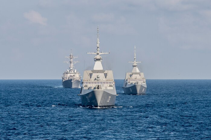 SOUTH CHINA SEA (July 21, 2015) The Republic of Singapore navy's RSS Intrepid (69), right, RSS Supreme (73), and the Arleigh Burke-class guided-missile destroyer USS Lassen (DDG 82), left, trail the littoral combat ship USS Fort Worth (LCS 3) during the underway phase of Cooperation Afloat Readiness and Training (CARAT) Singapore 2015. CARAT is an annual, bilateral exercise series with the U.S. Navy, U.S. Marine Corps and the armed forces of nine partner nations. 
