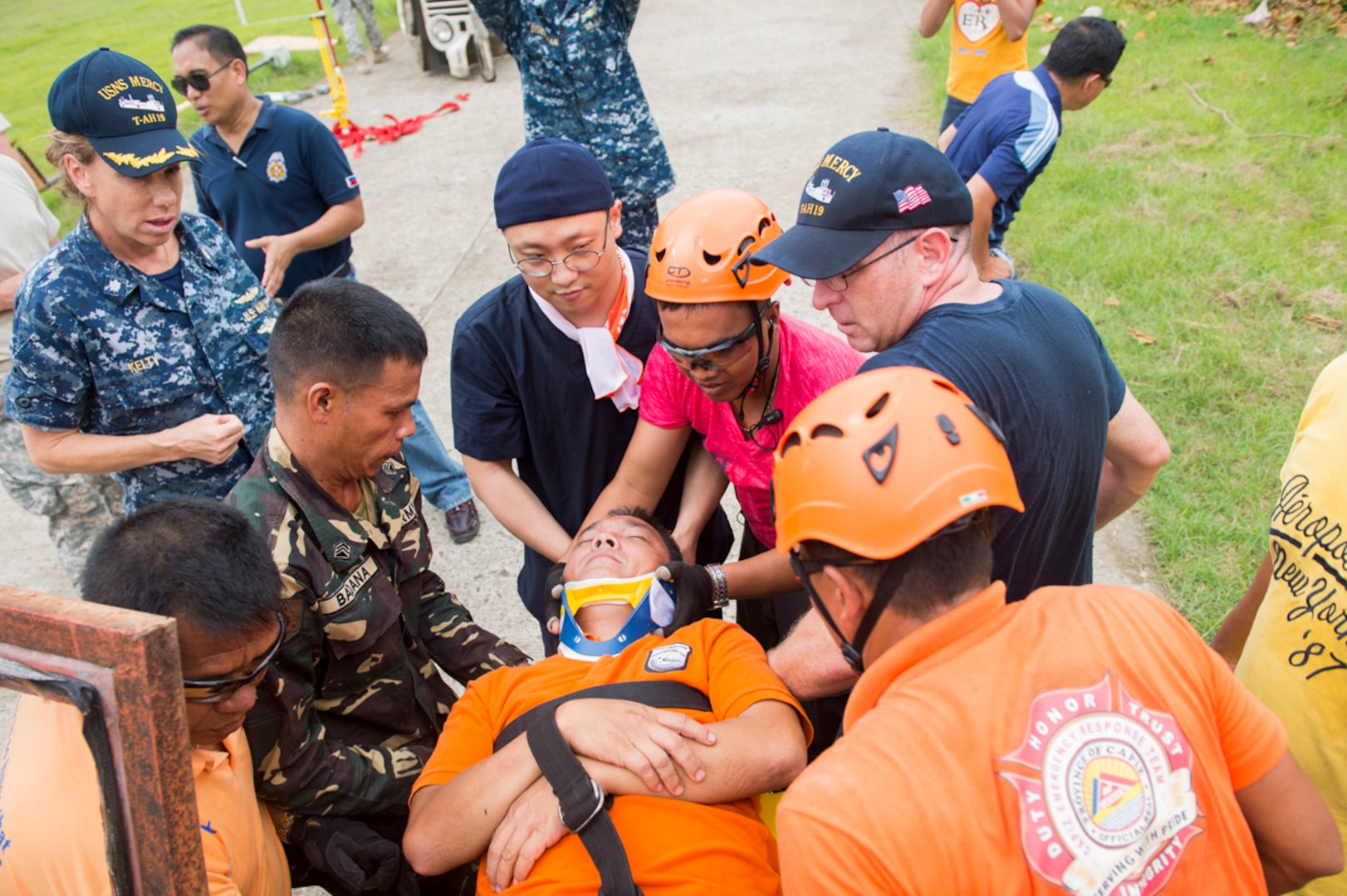 ROXAS CITY, Philippines (July 23, 2015)-  Filipino first responders, members of the Armed Forces of the Philippines and U.S. Navy and a Korean surgeon remove a simulated crash victim from a vehicle at Capiz National University. The training was part of a weeklong humanitarian assistance disaster relief symposium held in conjunction with the hospital ship USNS Mercy’s (T-AH 19) visit to the Philippines for Pacific Partnership 2015. Mercy is currently in the Philippines for its third mission port of PP15. Pacific Partnership is in its 10th iteration and is the largest annual multilateral humanitarian assistance and disaster relief preparedness mission conducted in the Indo-Asia-Pacific region. While training for crisis conditions, Pacific Partnership missions to date have provided real world medical care to approximately 270,000 patients and veterinary services to more than 38,999 animals. Additionally, the mission has provided critical infrastructure development to host nations through more than 180 engineering projects. 